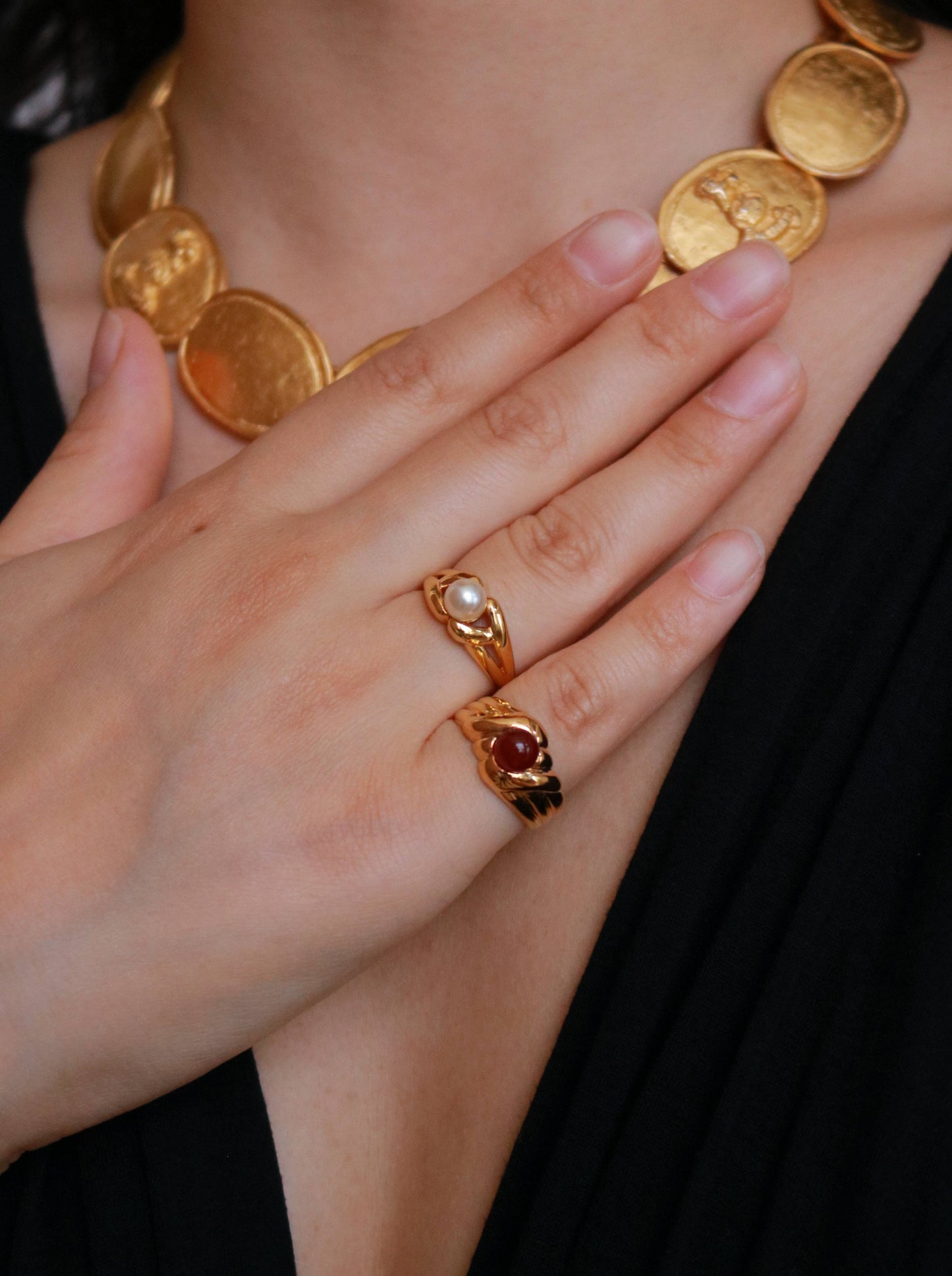 Vintage vermeil red agate ring worn on model, showcasing elegant French craftsmanship from the 1990s.