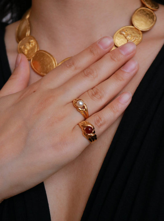 Vintage vermeil red agate ring worn on model, showcasing elegant French craftsmanship from the 1990s.