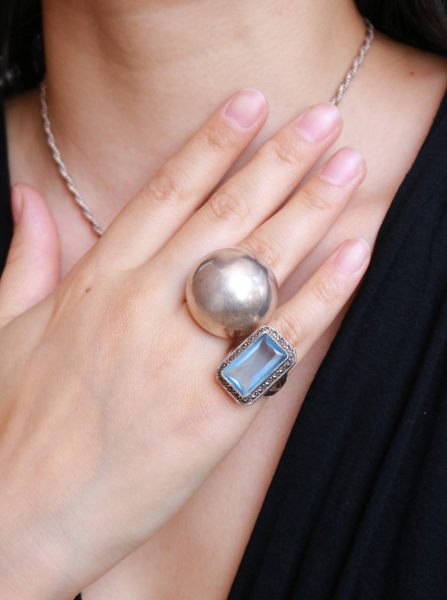 Vintage 925 sterling silver modernist dome statement ring in EU size 56 and US size 7.5 worn on the hand.