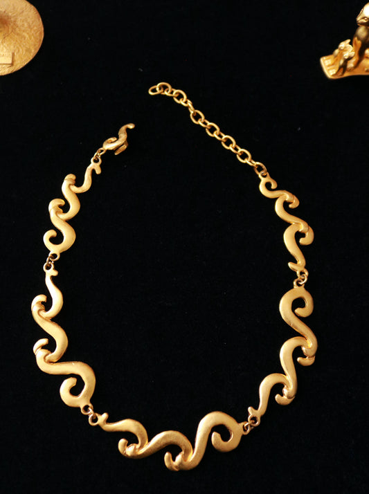 Authentic vintage Multiples gold-tone statement necklace, French, 1980s, featuring sculptural organic links.