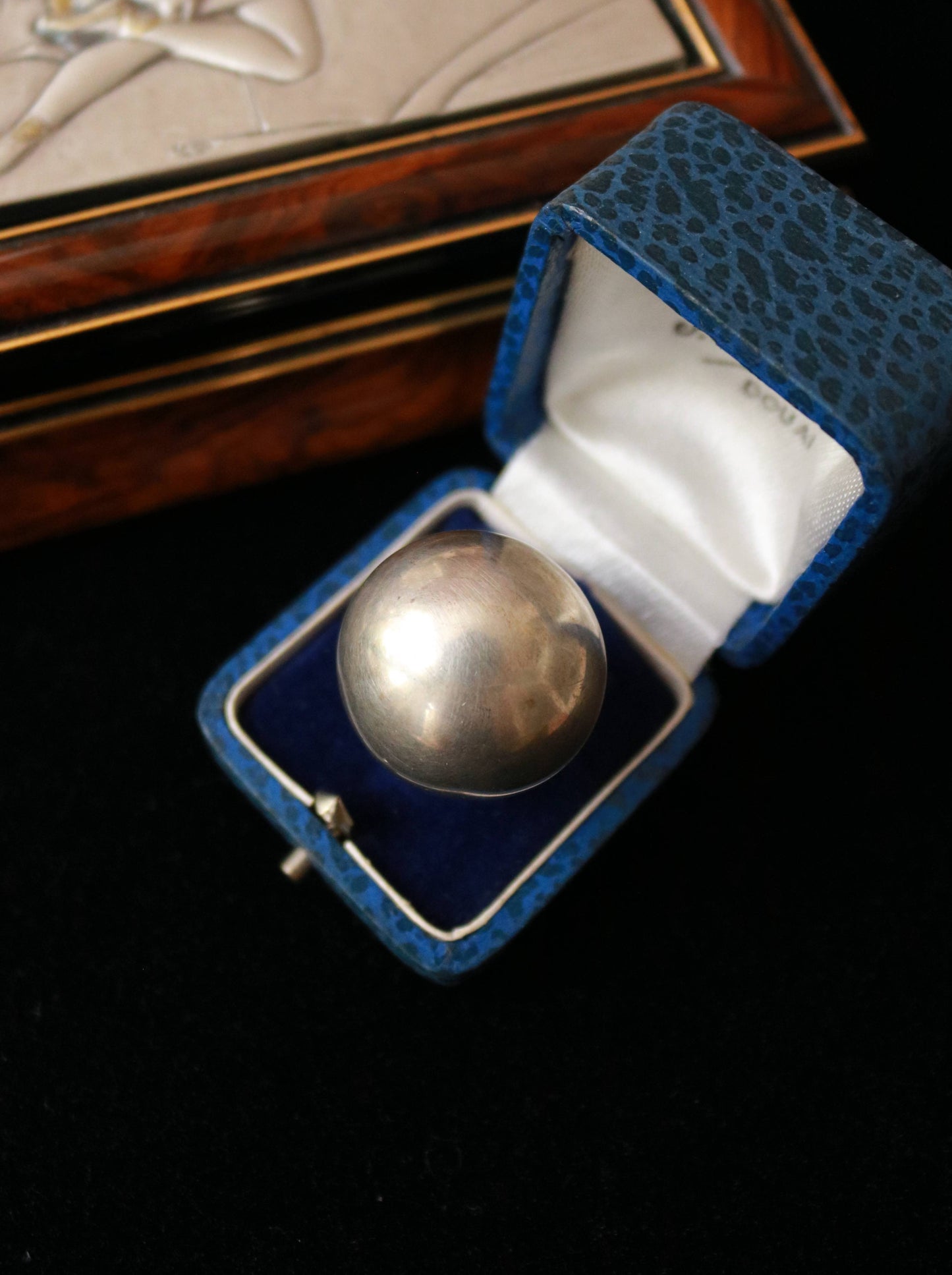 Vintage 925 sterling silver oversized dome statement ring displayed in a blue vintage jewellery box.
