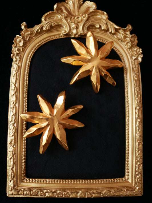 Vintage Christian Lacroix starburst clip-on earrings, France, 1980s.