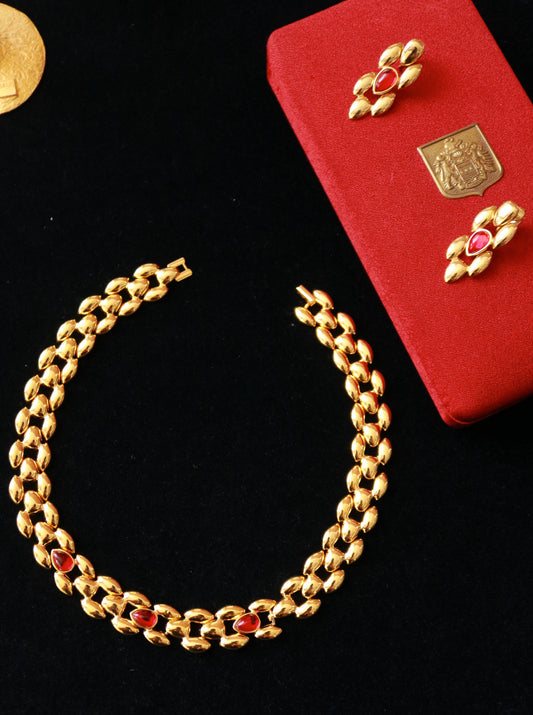 Vintage gold-tone red cabochon necklace and matching clip-on earrings parure.