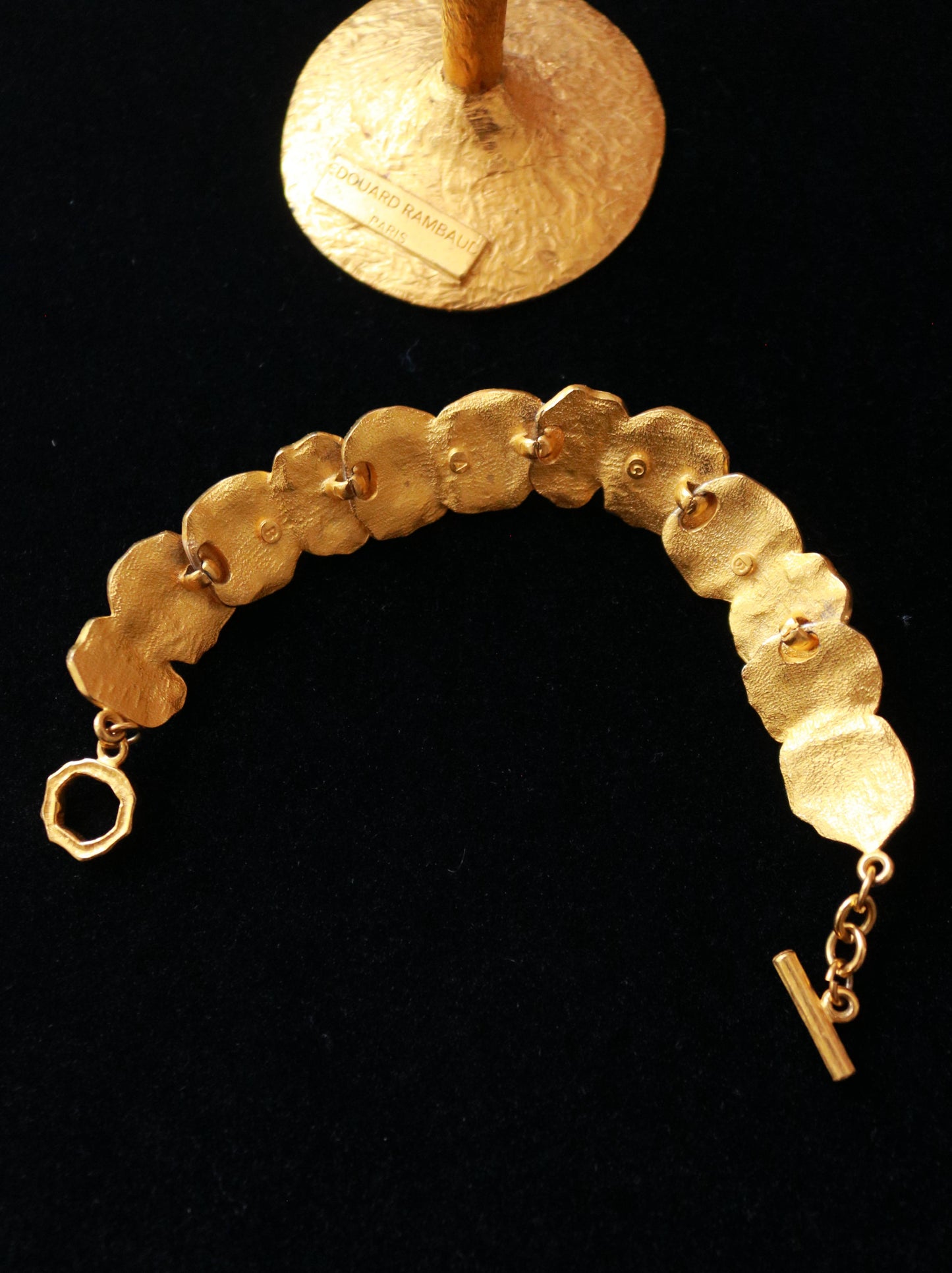 Close-up of signed BCAB vintage bracelet featuring sculptural textured organic gold plated links.