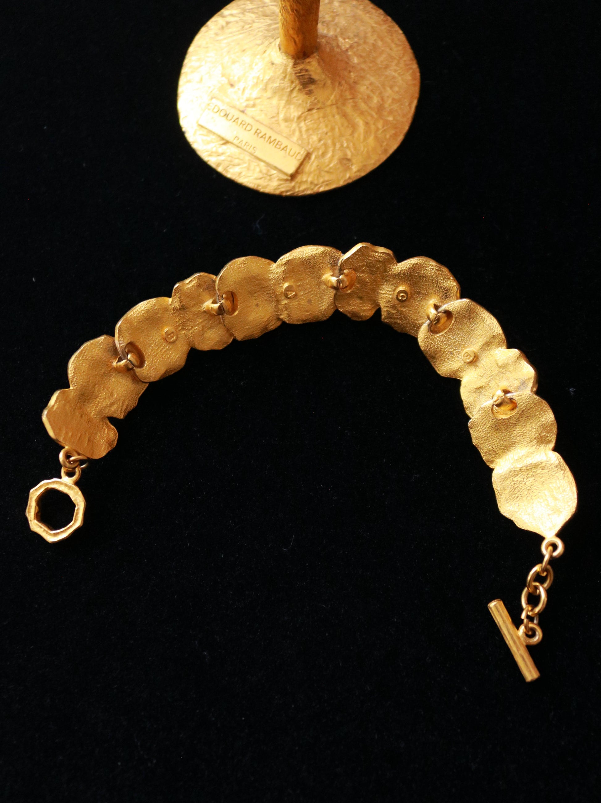 Close-up of signed BCAB vintage bracelet featuring sculptural textured organic gold plated links.