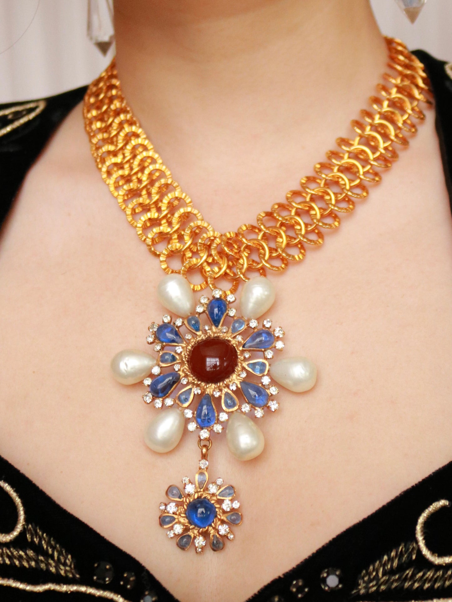 Authentic Chanel Haute Couture necklace from the 1980s with gold-tone chain and jeweled pendant.